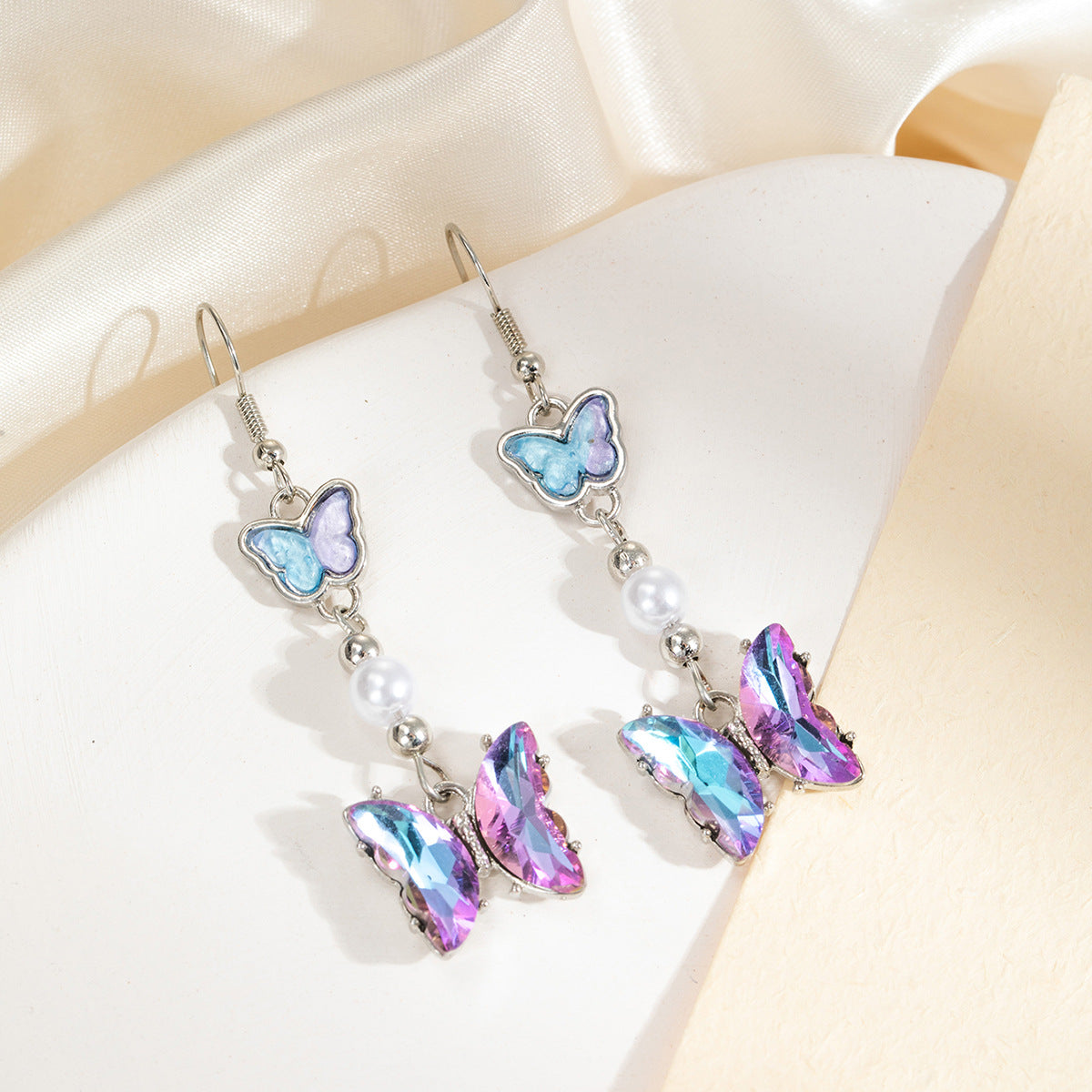 Wholesale Silver Needle Gradient Butterfly Diamond Pearl Earrings